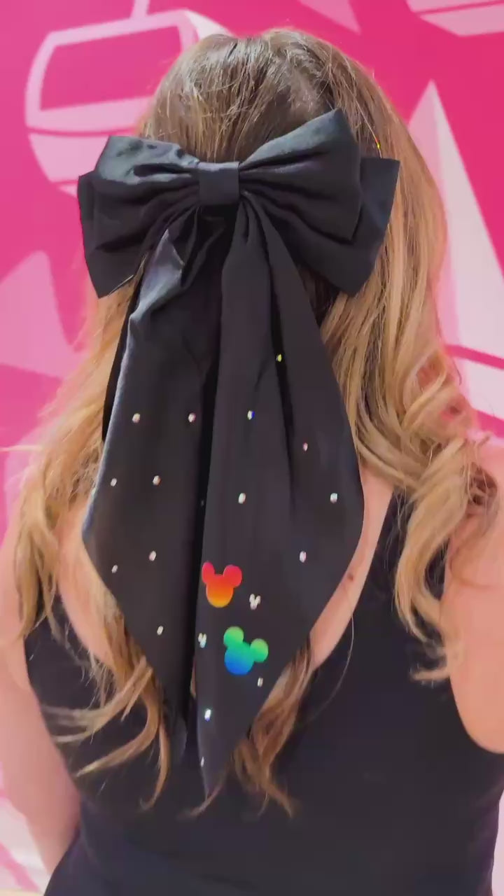 video of black bow with mickey decal and rhinestones