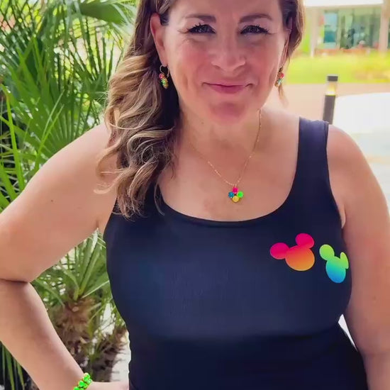 Woman in rainbow black mickey dress video 