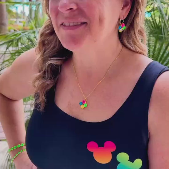 Woman in rainbow black mickey dress video 