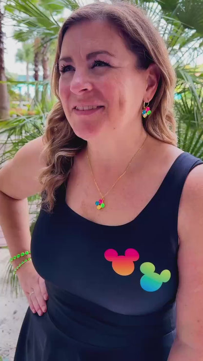 Woman in rainbow black mickey dress video 